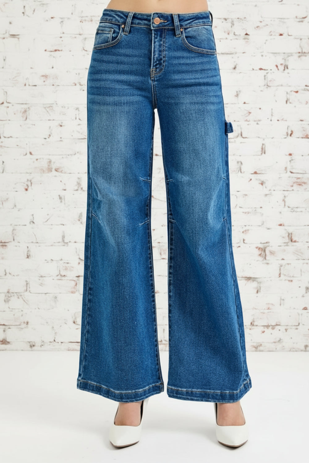 Risen Jeans, full-size, high-rise, darted, wide leg, one side hammer loop, pocketed, belt loops, button/zipper closure, washed, raw hem, slightly stretchy, front view
