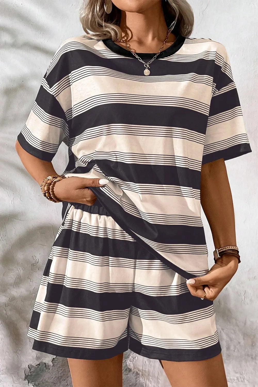 Two-piece short set, round neck, drop shoulder, half sleeves, striped pattern, elastic waist, no drawstring, pocketed, high waist, wide leg, slightly stretchy front view