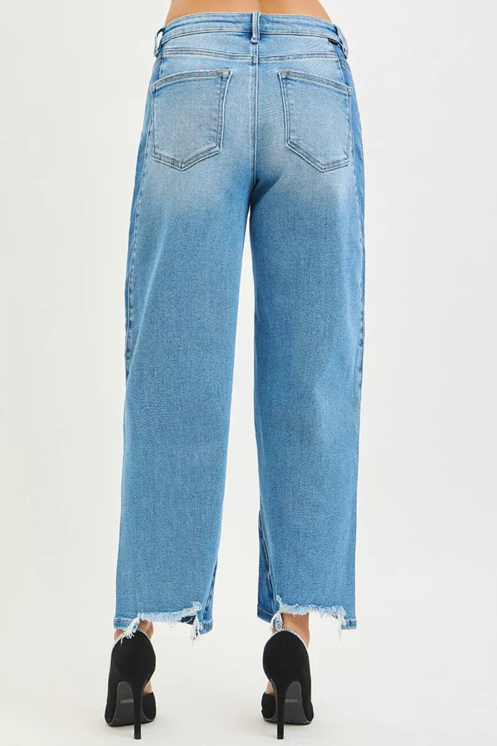 Risen Jeans, full-size, mid-rise, slouchy, cropped, barrel shape, dark combo, raw hem, belt loops, button/zipper closure, pocketed, slightly stretchy, back view