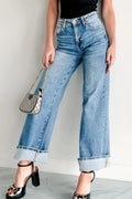 Jeans, high-waist, light wash, wide leg, pocketed, belt loops, button/zipper closure, relaxed fit, slightly stretchy, front view