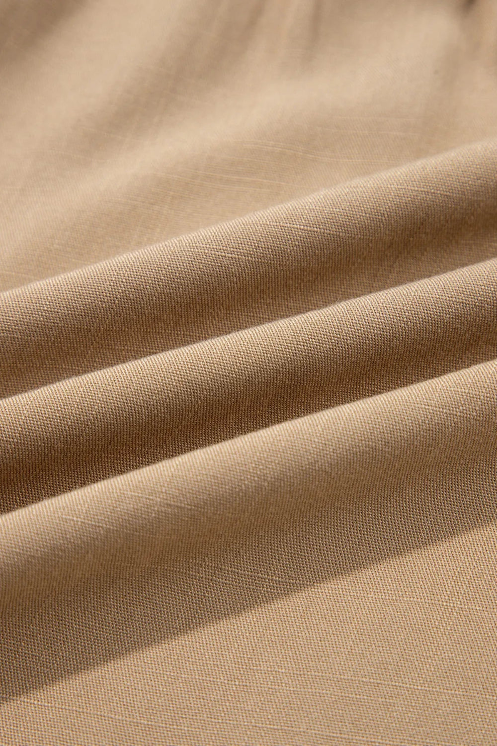 Shirt, long sleeve, collared neck, buttoned, waffle-knit, patchwork, pleated, frayed hem, stretchable, close up view