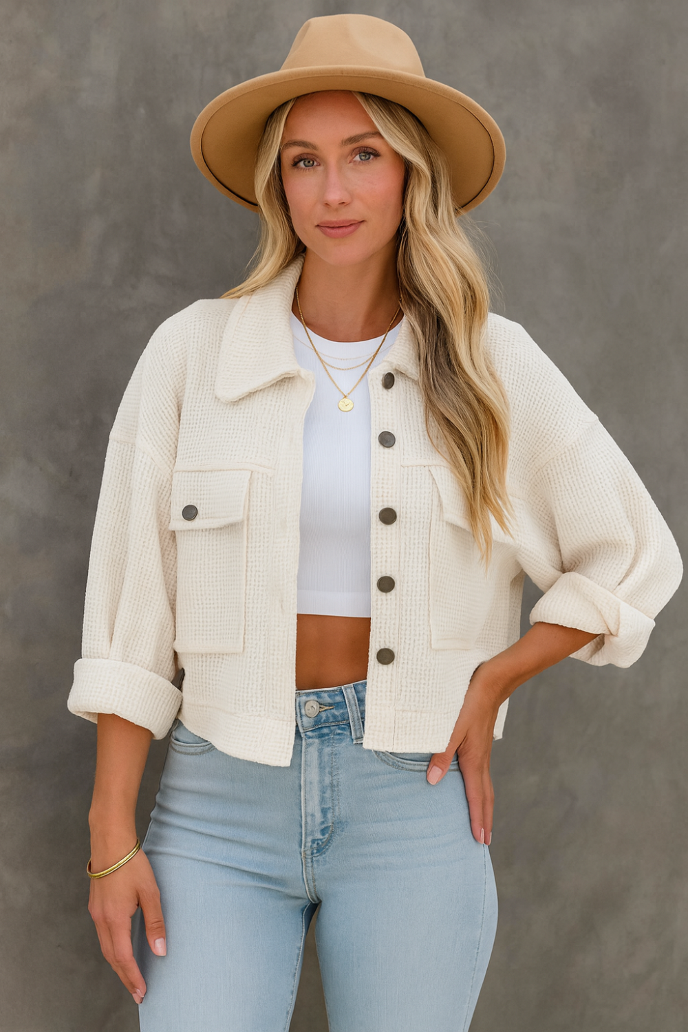Jacket, collared, oversized, distressed, pleated, drop shoulder, buttoned, pocketed, long sleeve, waffle-knit, exposed seam, sits at the waist, pleated, adjustable straps, some stretch front view