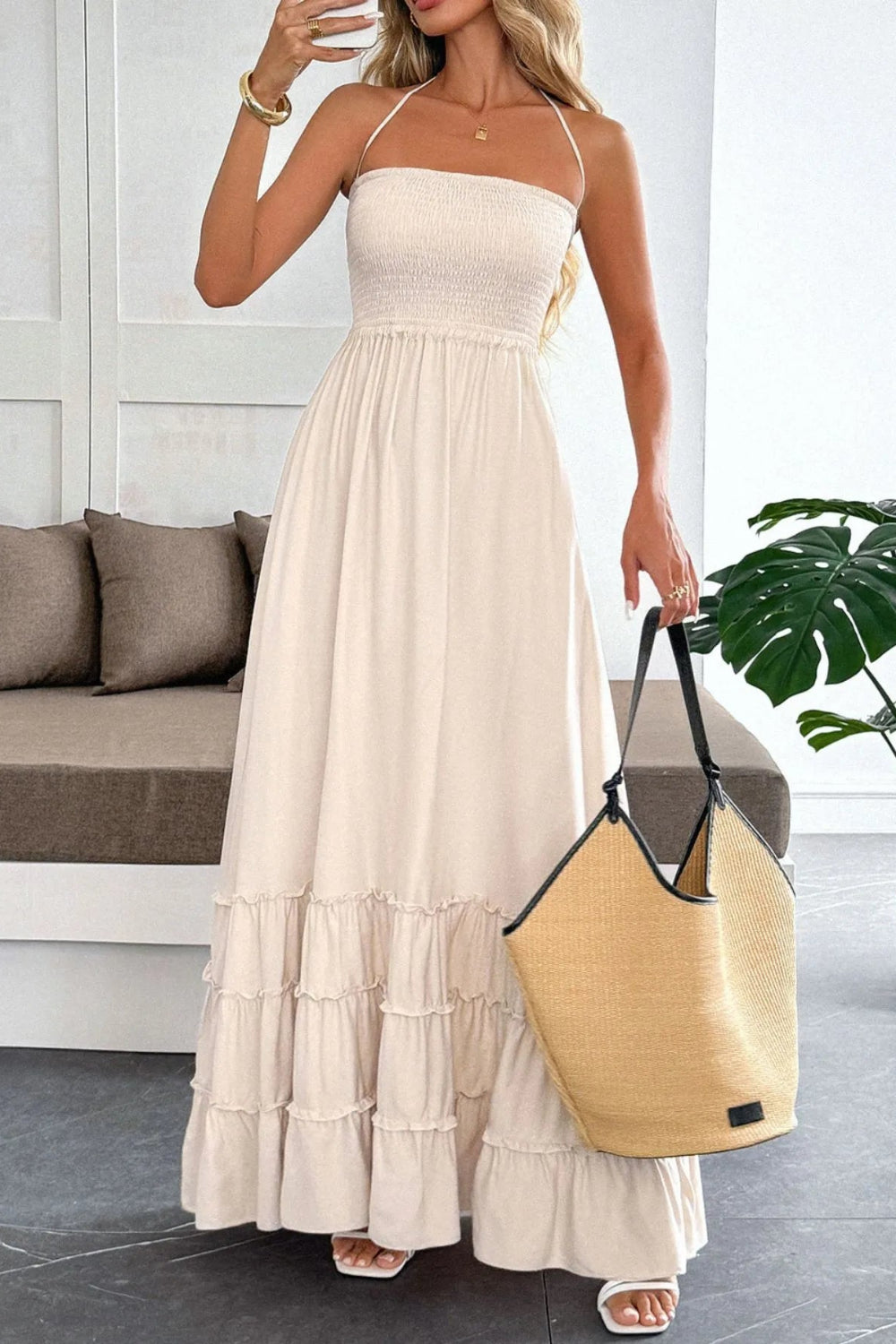 Maxi dress, halter tied, sleeveless, smocked, tiered, ruffled, frilled, backless, unlined, slightly stretchy, front view