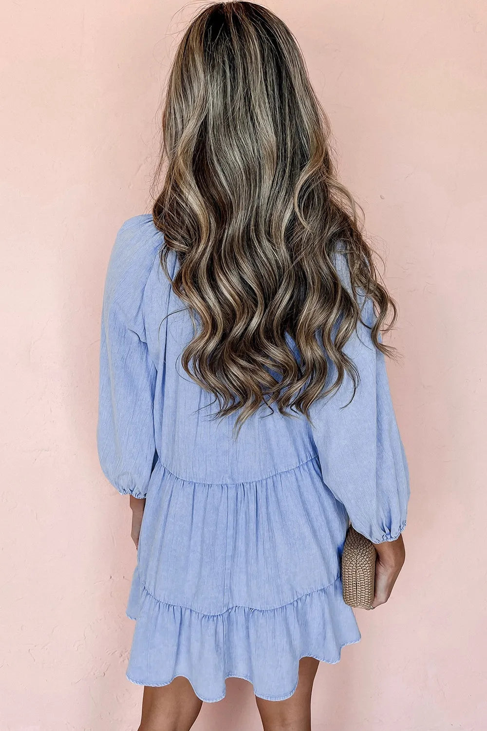 Mini dress, denim, 3/4 sleeve, v-neck, light wash, tiered, pleated, elastic wrist, no stretch, back view