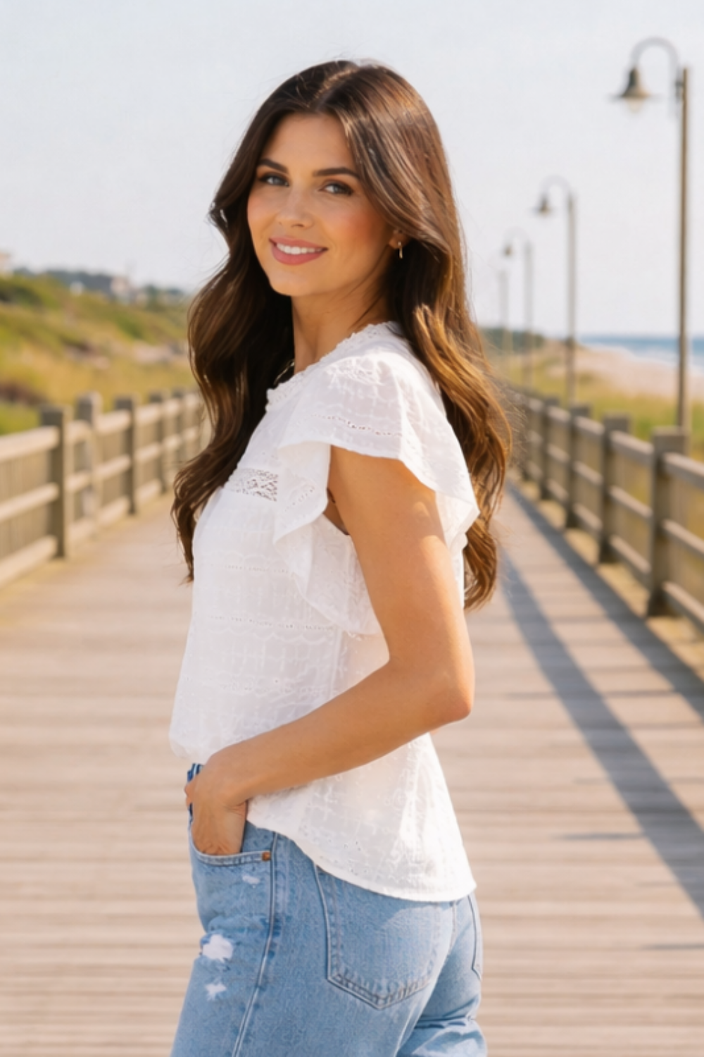 * Round neck
* Flutter sleeve
* Keyhole closure
* Eyelet
* Lace
* Opaque
* Some stretch