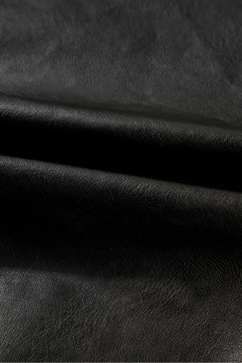 Faux leather jacket, buttoned, pocketed, lined, boxy, no stretch close up view