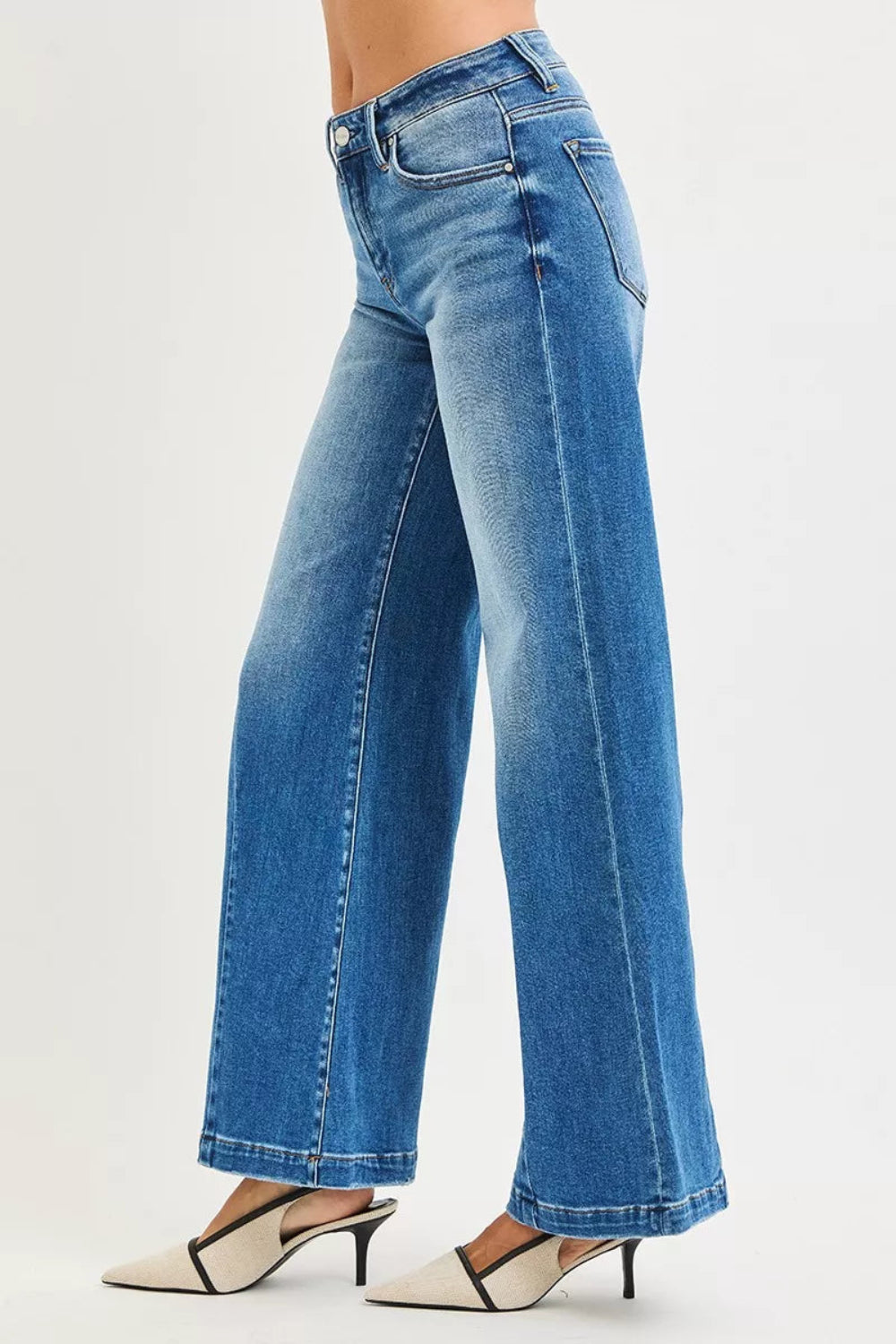 Risen Jeans, full-size, mid-rise, wide leg, flared look, medium wash, belt loops, button/zipper closure, pocketed, bottom dark, slightly stretchy, side view