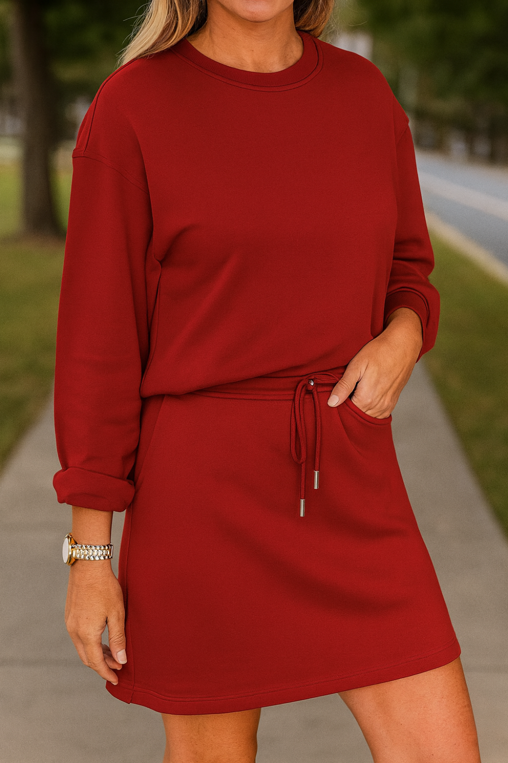 Mini skirt set, two-piece, round neck, drop shoulder, drawstring with aglets, waist with grommets for drawstring, pocketed, side slit, slightly stretchy, front view
