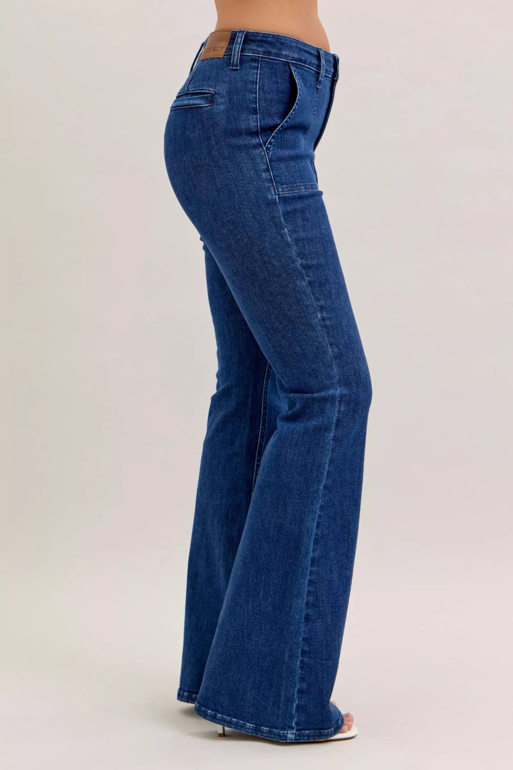 Judy Blue Jeans, high-rise, front patch pockets, flared, dark wash, belt loops, back pockets, button/zipper closure, slightly stretchy, side view