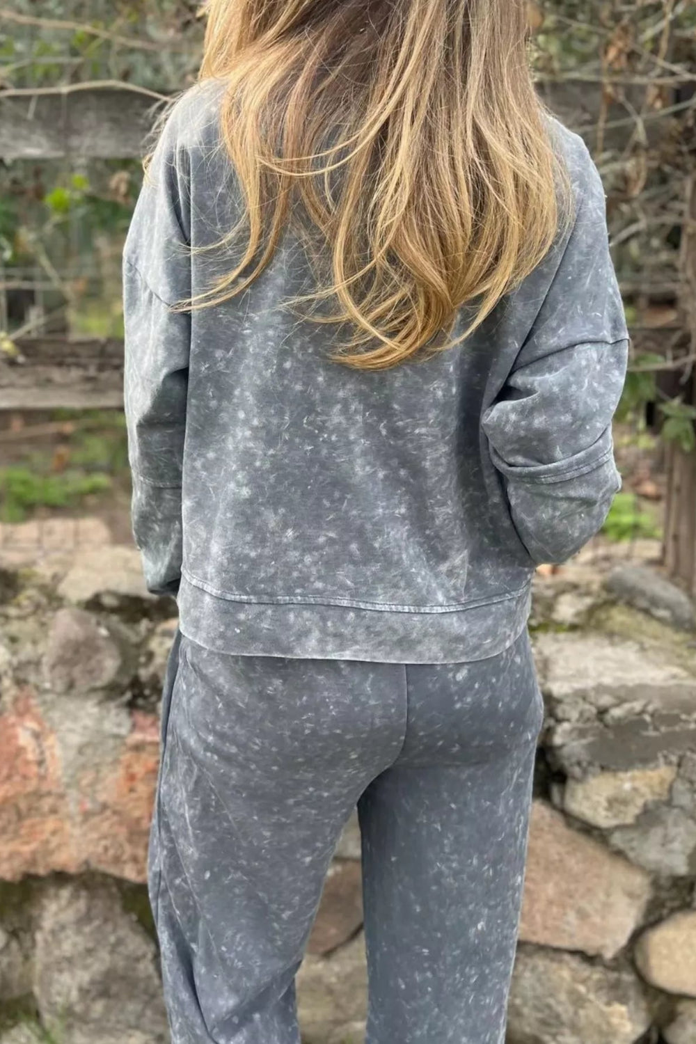 Two-piece pant set, pullover, long sleeve, drop shoulder, round neck, exposed seam,  side slit, elastic waist, drawstring, pocketed, stretchy, back view