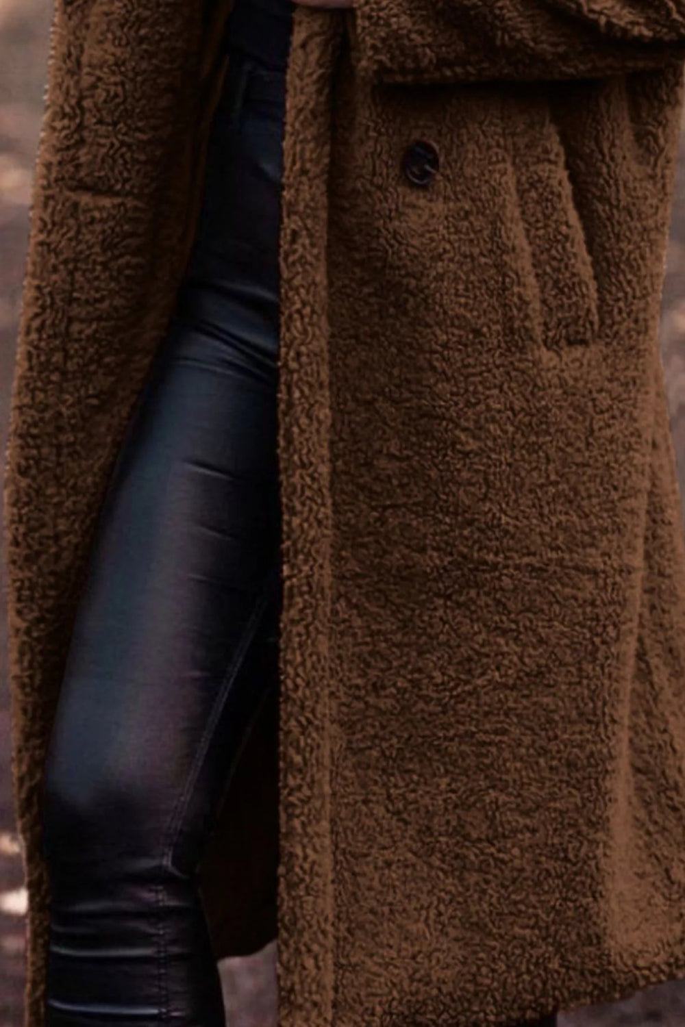 Coat, longline, lined, hooded, one button closure, pocketed, thick, oversized, slightly stretchy, close up view
