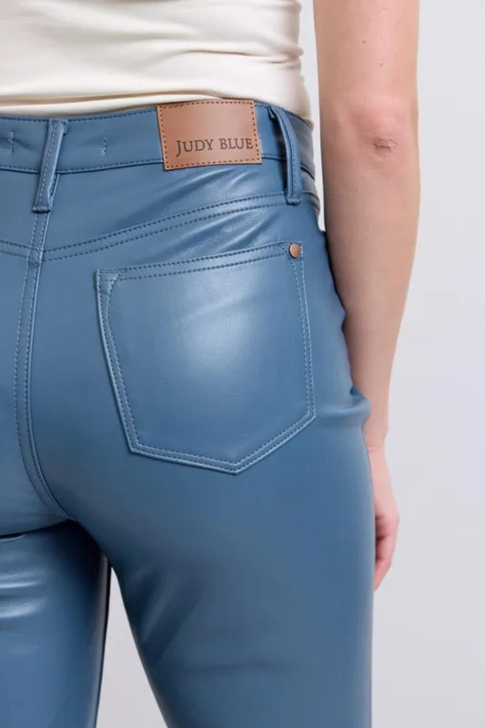 Judy Blue Pants, full-size, high-rise, tummy control, faux leather, straight leg, pocketed, brad detail, some stretch close up view