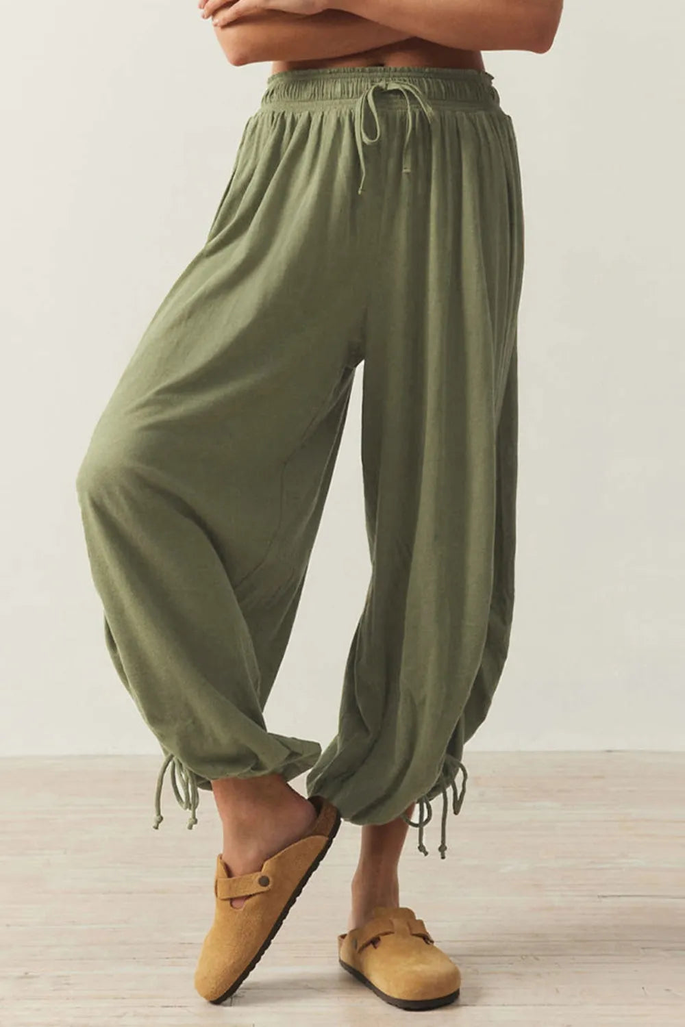 Pants, opaque, ruched, drawstring, elastic waist, opaque, pleated, adjustable hem ties, no stretch, front view

