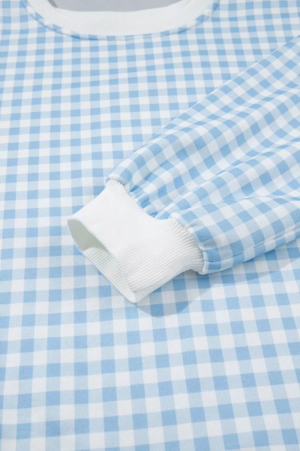 Since You Asked Short Set in light blue and white gingham with a long-sleeve top, white ribbed trim, and matching shorts.