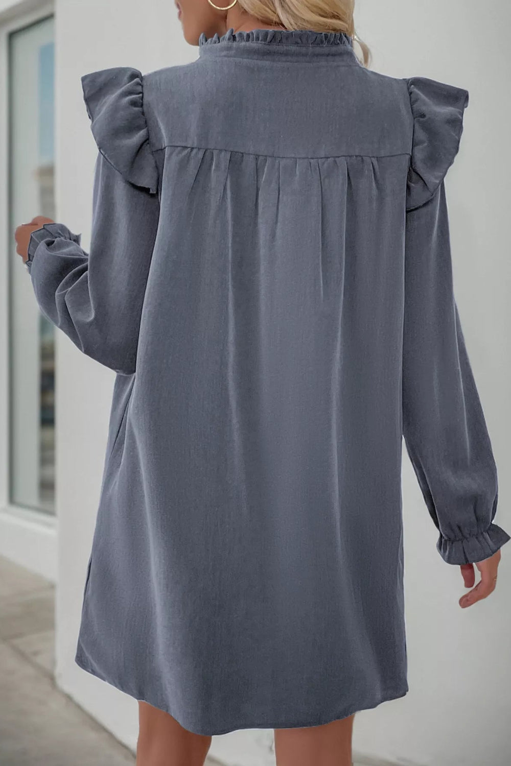 Mini dress, long sleeve, ruffled, v-neck, baby doll design, pullover, unlined, side slit, no stretch, back view