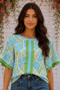 * Pullover
* Round neck
* Half sleeve
* Color block
* Ruffled
* Floral print
* Round hem
* No stretch