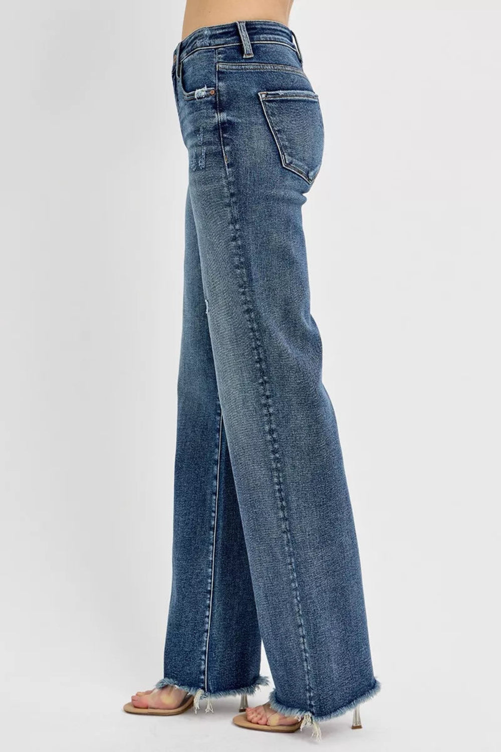 Risen Jeans, full-size, high-rise, distressed, raw hem, long, straight leg, dark wash, button/zipper closure, belt loops, pocketed, slightly stretchy, side view