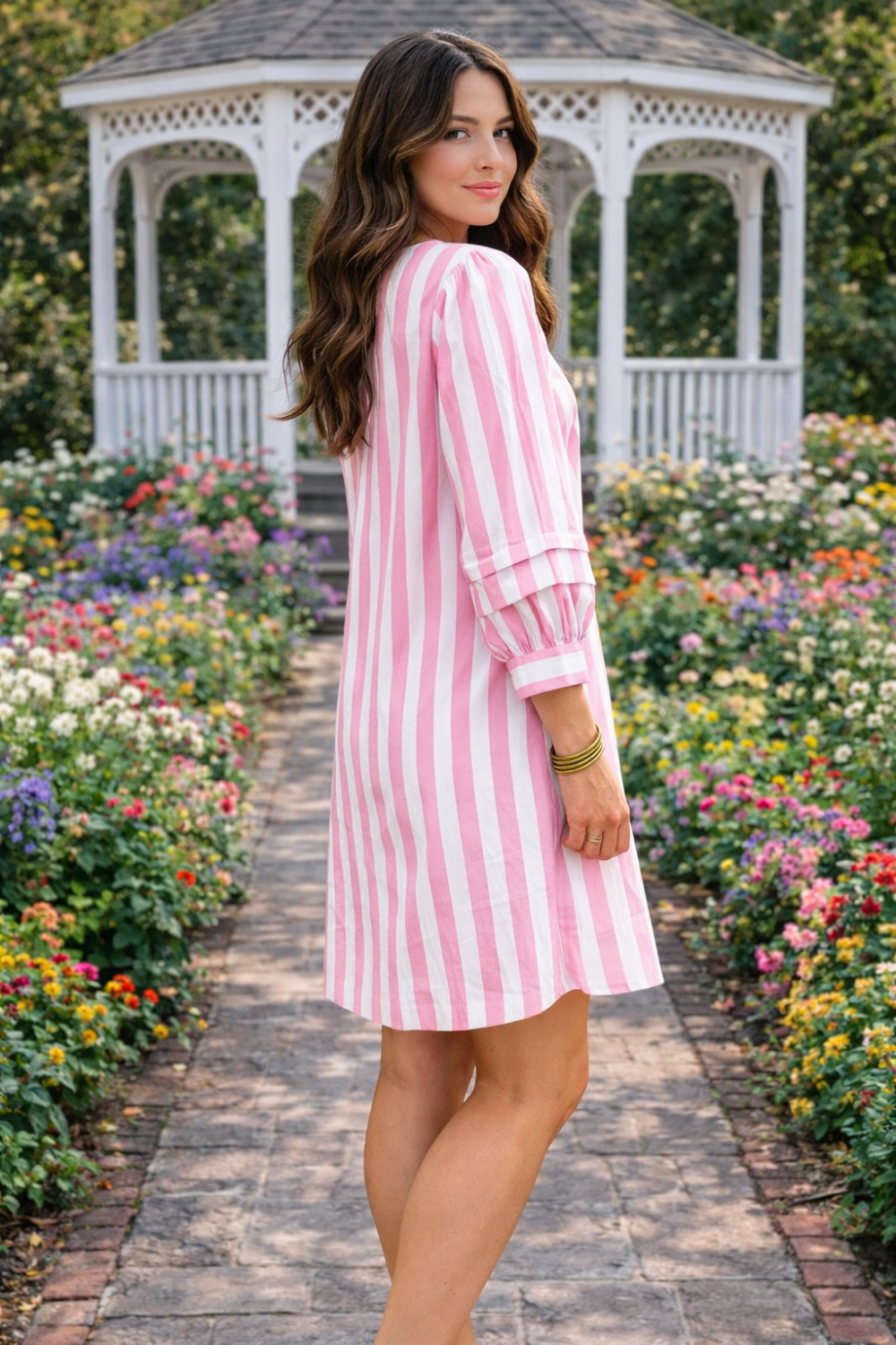 * Mini dress
* Notched neck
* 3/4 sleeves
* Buttoned
* Unlined
* Striped
* No stretch