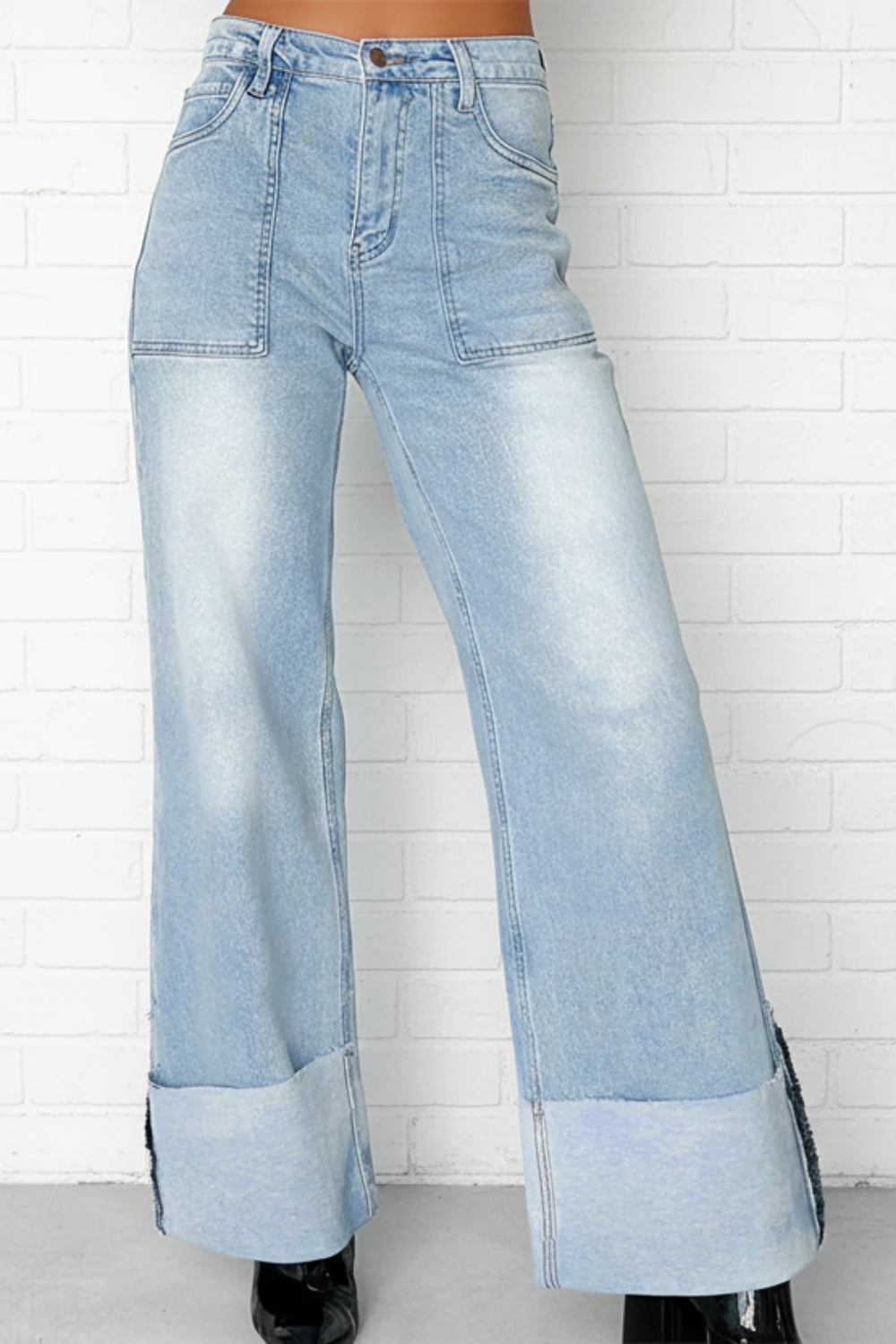Jeans, high-waist, wide leg, high raw hem cuff, front patch pockets, light vintage wash, back pockets, belt loops, button/zipper closure, relaxed fit, slightly stretchy, front view
