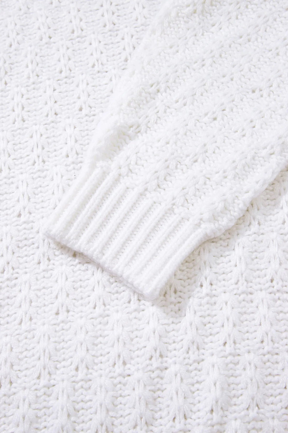 Sweater, pullover, long sleeve, ribbed edges, textured knit, v-neck, eyelet, loose fit, close up view