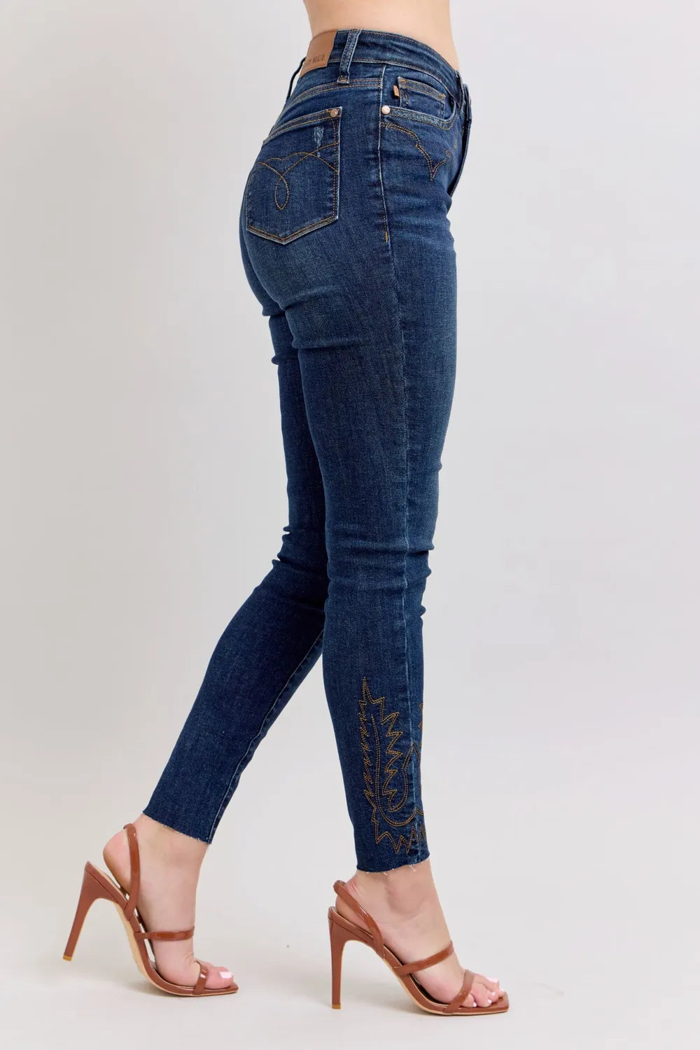Judy Blue Jeans, full-size, high-rise, skinny, dark wash, pocketed, belt loops, button/zipper closure, embroidered, stretchy, side view