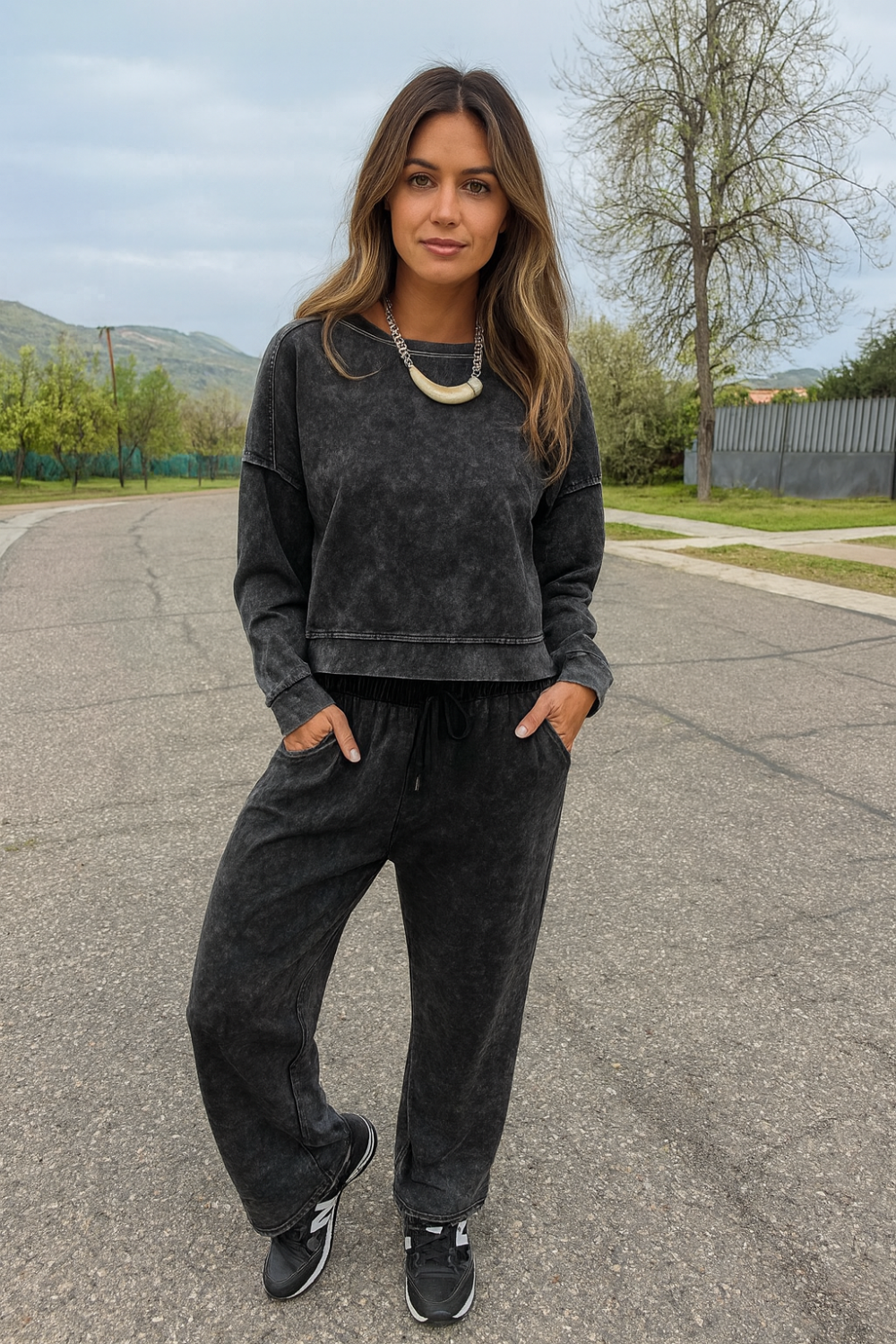 Two-piece pant set, pullover, long sleeve, drop shoulder, round neck, exposed seam, side slit, elastic waist, drawstring, pocketed, stretchy, front view

