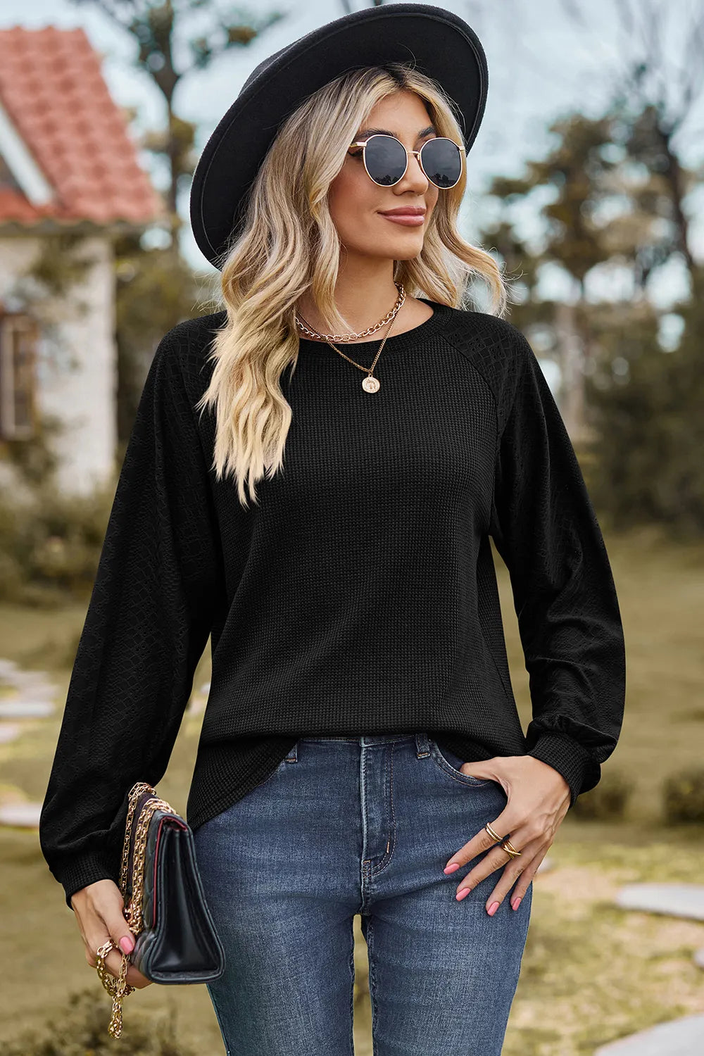 Top, raglan style, round neck, long sleeve, eyelet sleeves, ribbed, opaque, slightly stretchy, front view