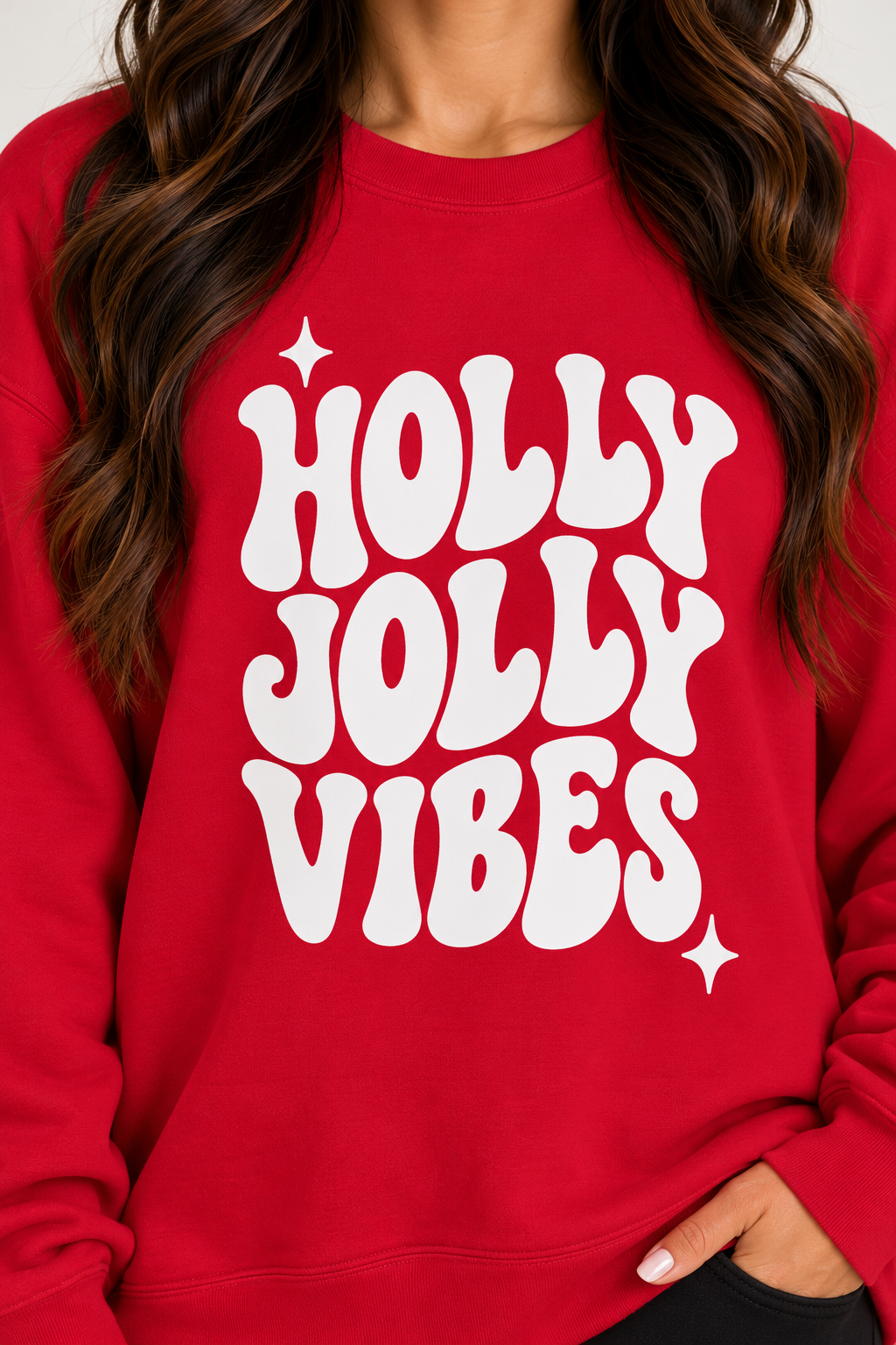 Holly Jolly Vibes Graphic Sweatshirt in Christmas red with bold white retro lettering, starburst accents, crew neckline, drop shoulders and long sleeves.