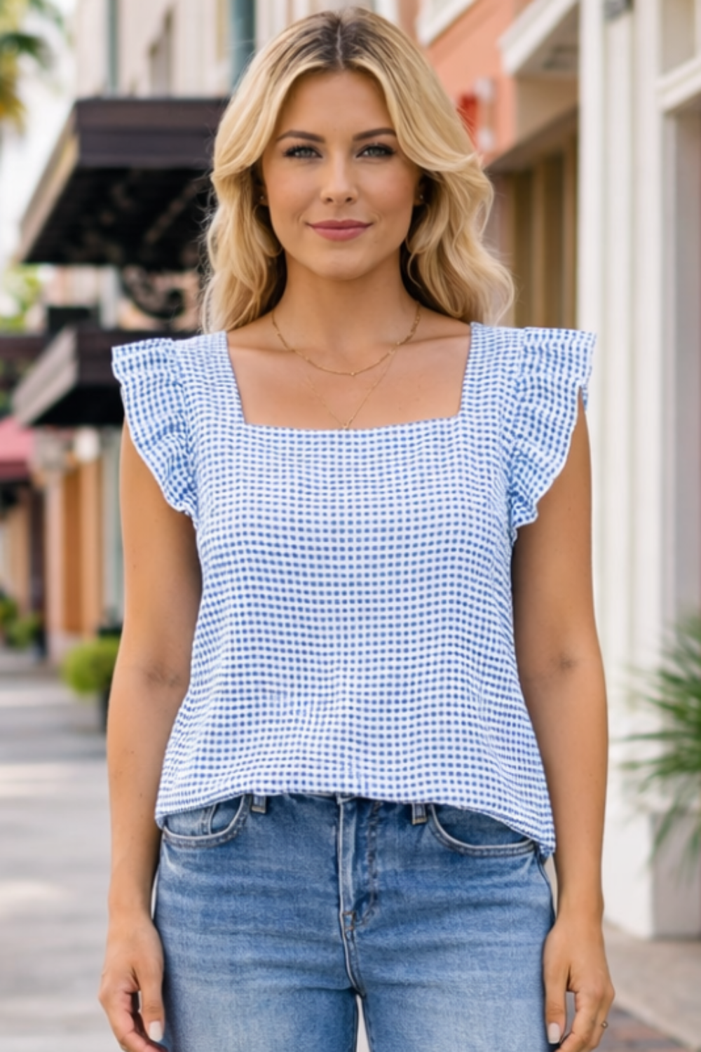* Gingham top
* Square neck
* Ruffled sleeves
* No stretch