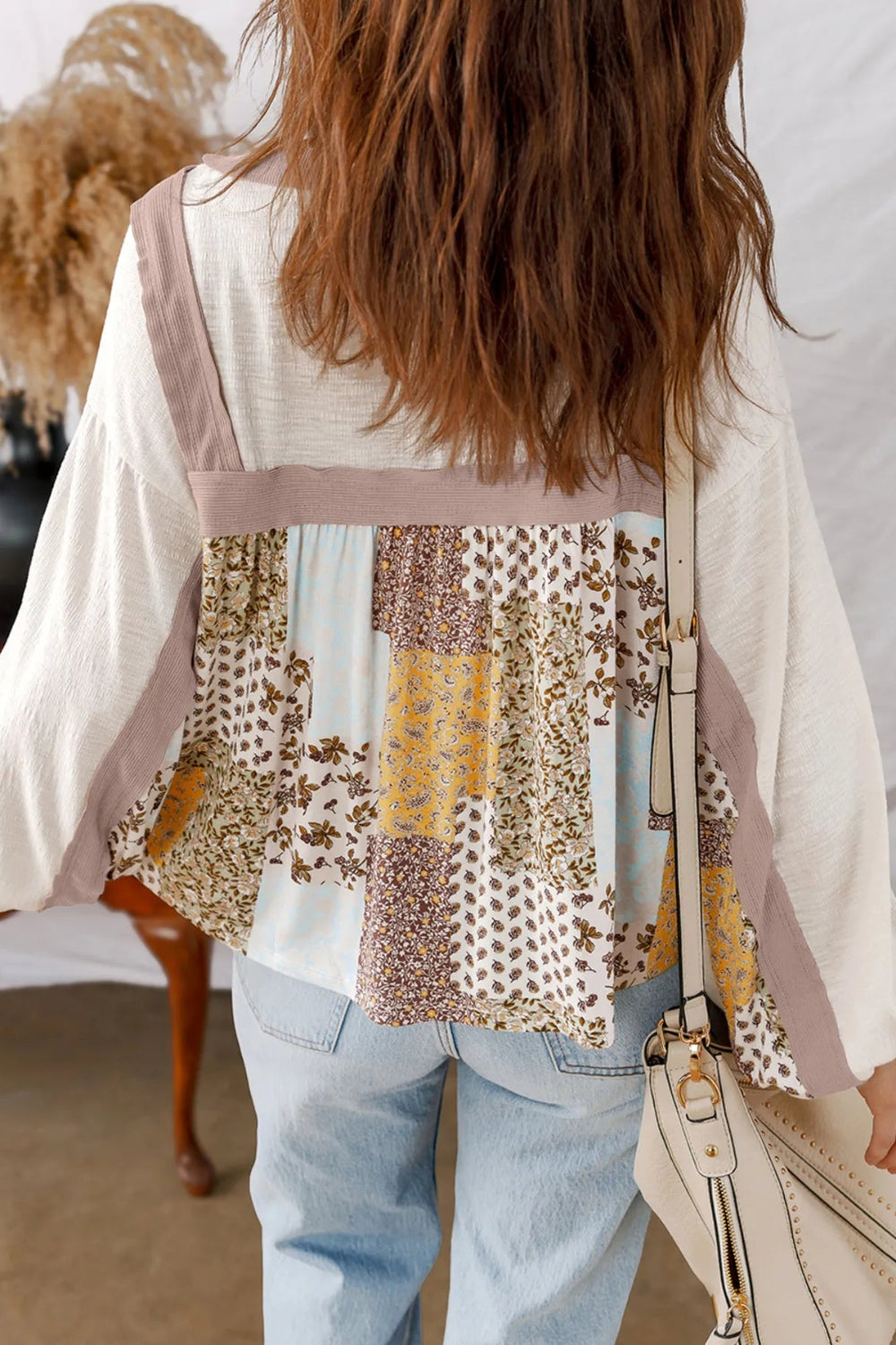 Top, pullover, long sleeve, v-neck, patchwork, floral print, contrast trim, baby doll style, no stretch, back view