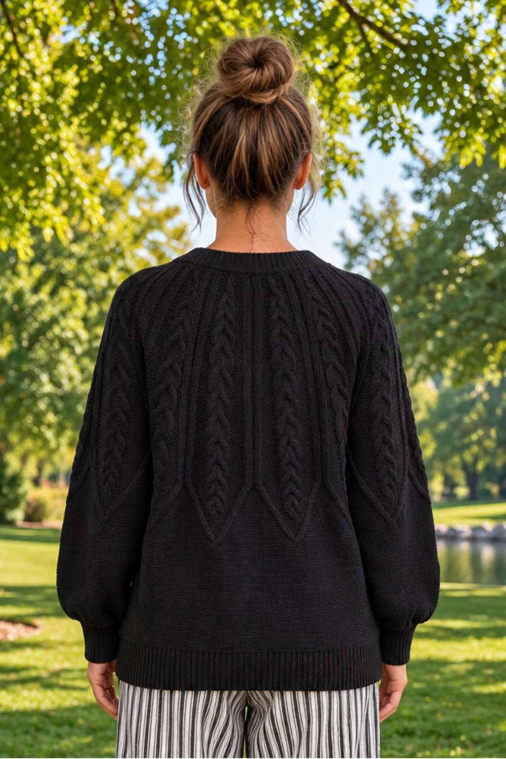 * Sweater
* Round neck
* Long sleeve
* Ribbed
* Cable-knit
* Slightly stretchy