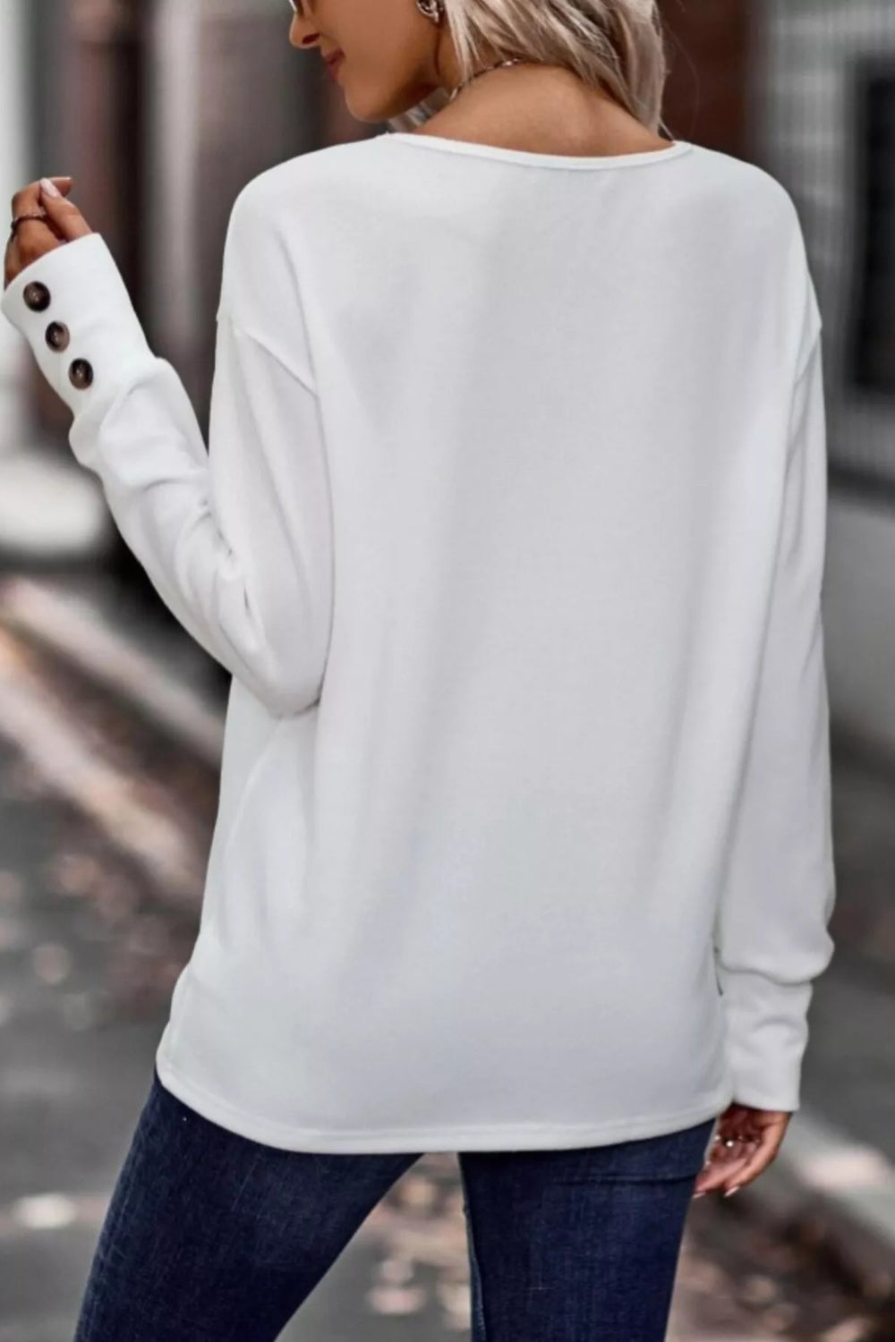 top, long sleeve, drop shoulder, v-neck, pullover, decorative buttons, straight hem, comes in many colors, stretchy, back view