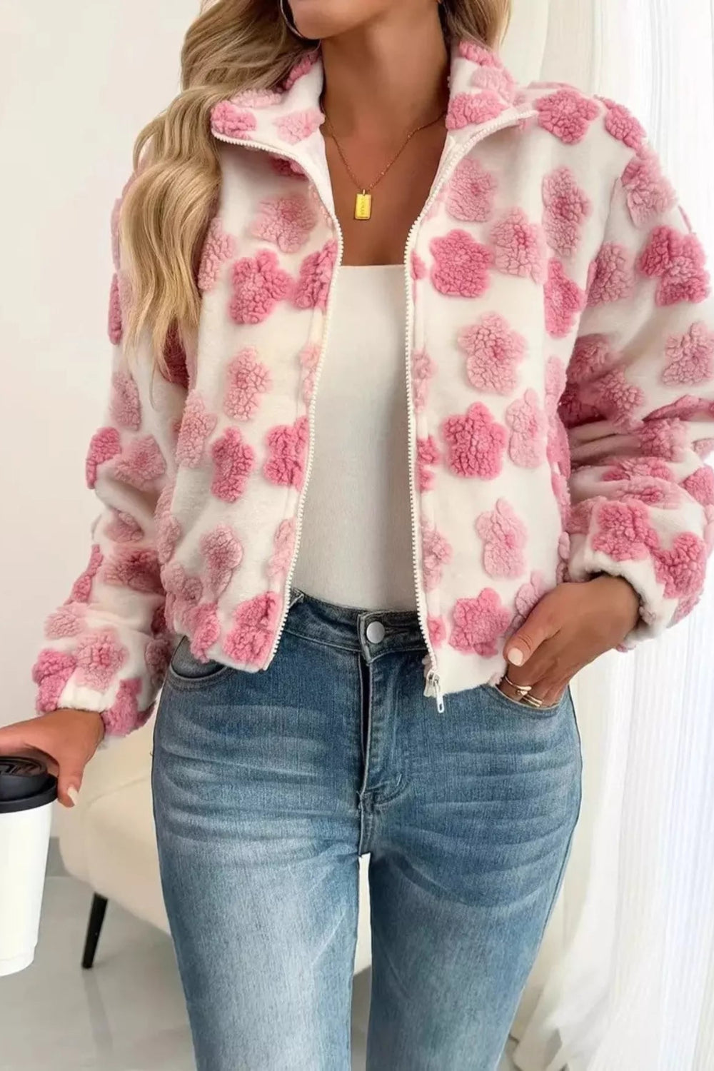 Jacket, unlined, collared, zippered, pocketed, puffy fleece flowers, oversized, sits at the waist, elastic waist and cuffs, no stretch, front view