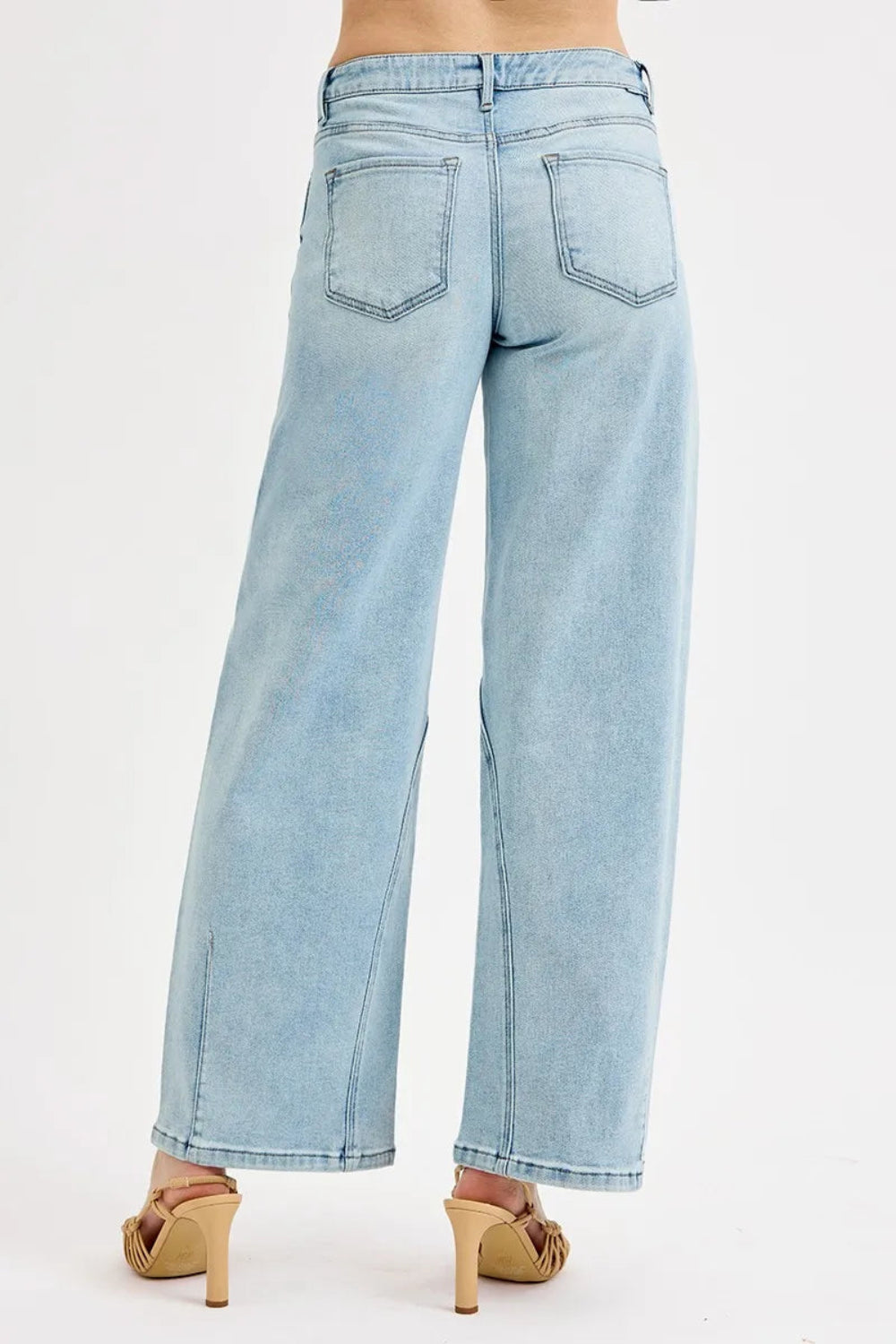 Risen blue jeans, full-size mid-rise, barrel fit, 5-pocket detail, button-zipper closure, belt looped, light wash, slightly stretchy, back view