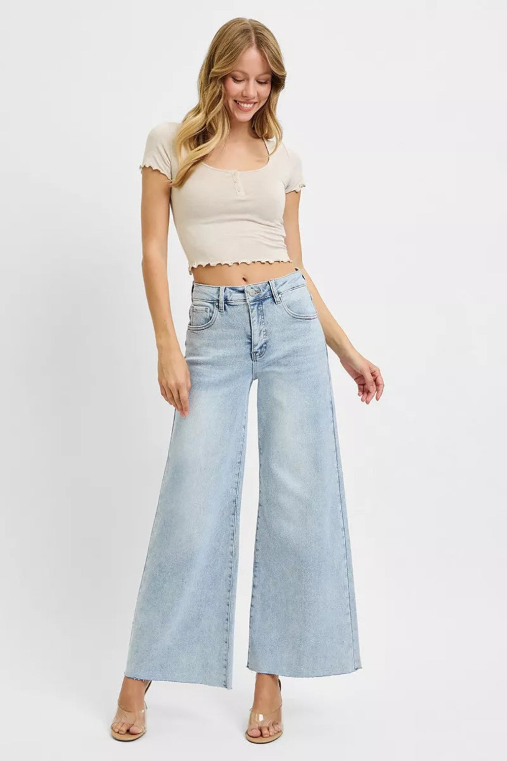Risen Jeans, full-size, high-rise, wide leg, palazzo style, light wash, raw hem, button/zipper closure, belt loops, pocketed, slightly stretchy, front view
