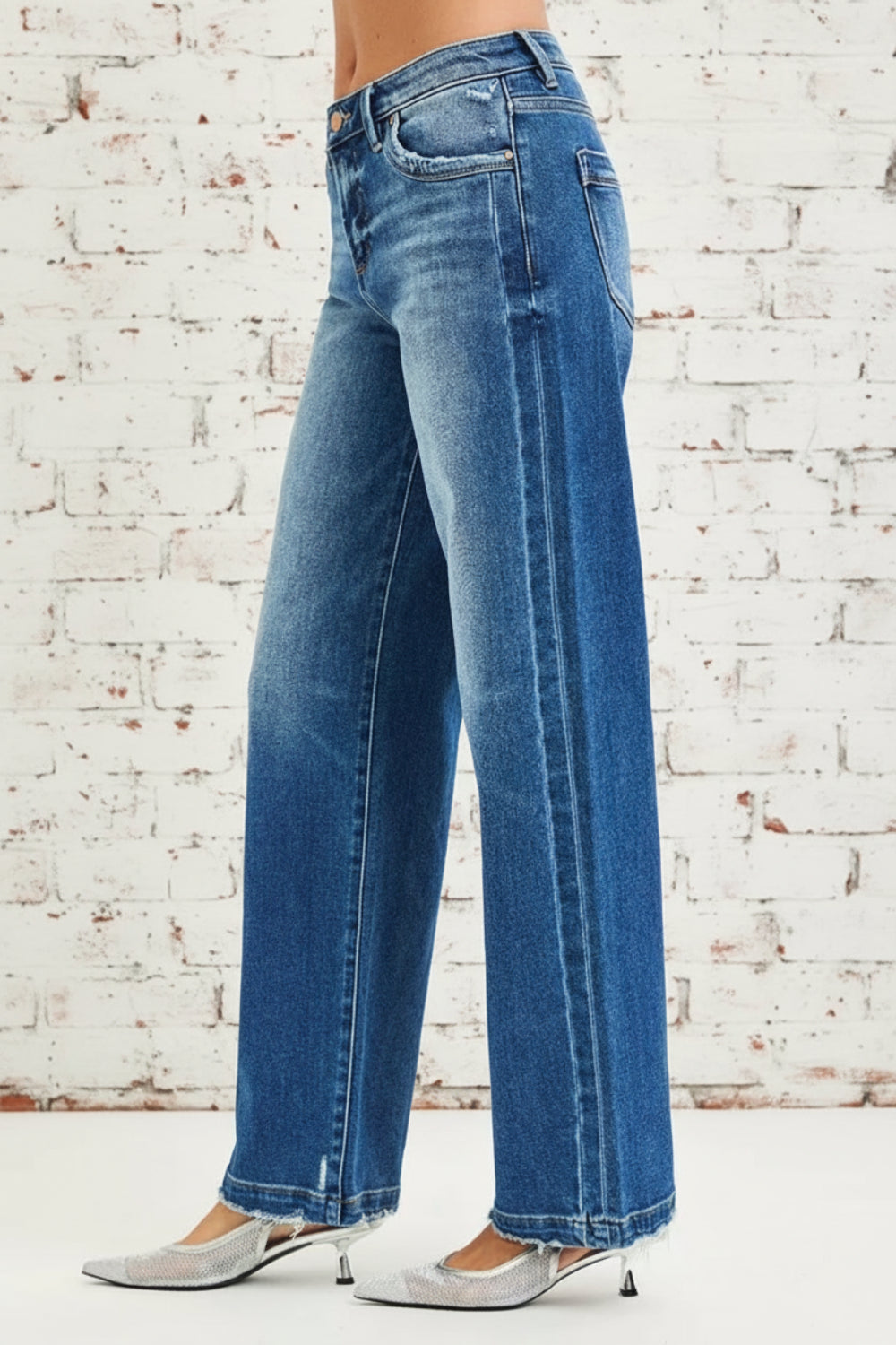 Risen Jeans, full-size, mid-rise, side seam detail, raw hem, slouchy, baggy, belt loops, pocketed, button/zipper closure, slightly stretchy, side view
