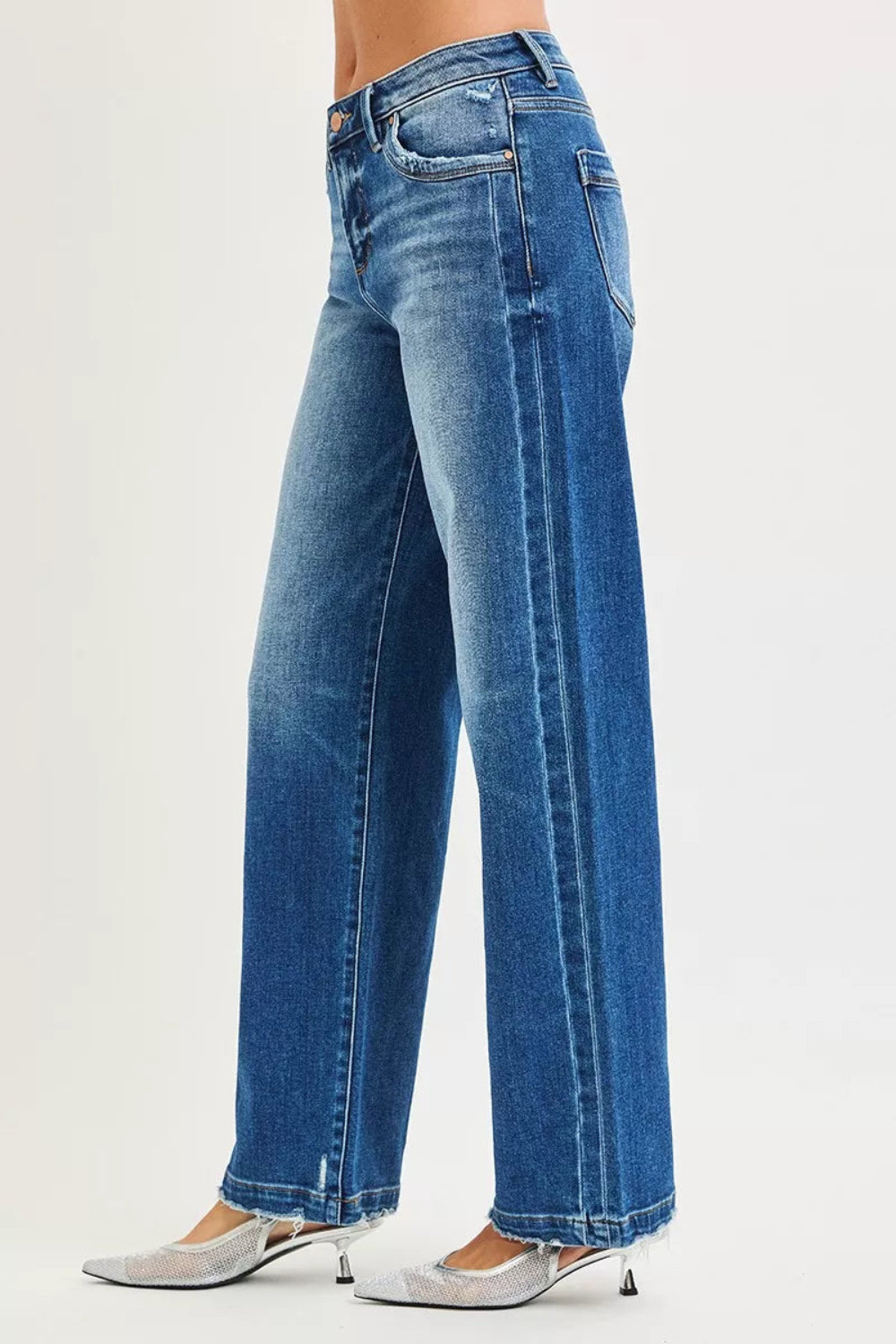 Risen Jeans, full-size, mid-rise, side seam detail, raw hem, slouchy, baggy, belt loops, pocketed, button/zipper closure, slightly stretchy, side view
