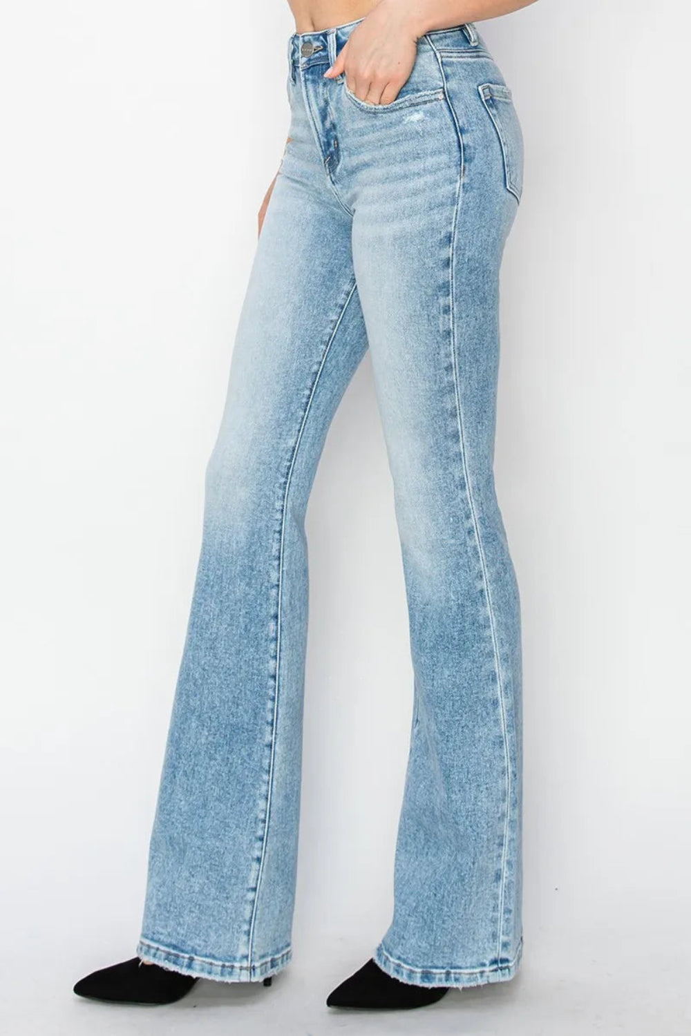 Risen Jeans, high-rise, 5-pocket construction, button/zip closure, light blue vintage wash, belt loop waistband, flared leg, slightly stretchy, side view