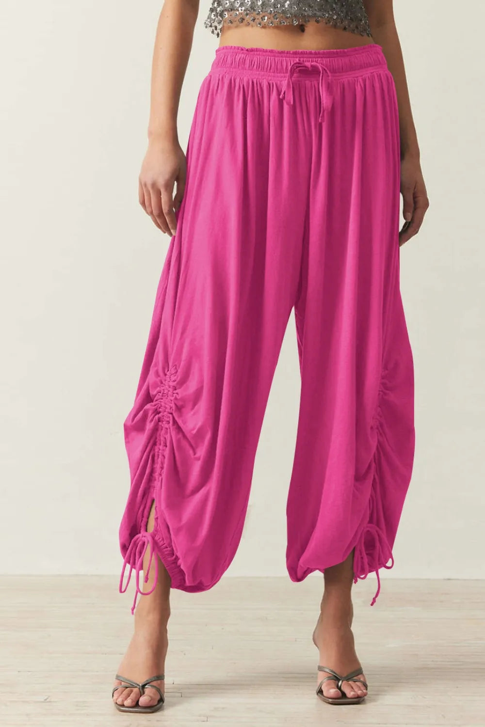 Pants, opaque, ruched, drawstring, elastic waist, opaque, pleated, adjustable hem ties, no stretch, front view

