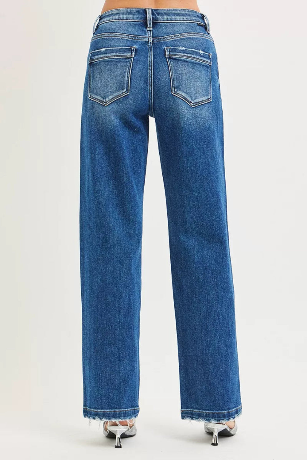 Risen Jeans, full-size, mid-rise, side seam detail, raw hem, slouchy, baggy, belt loops, pocketed, button/zipper closure, slightly stretchy, back view
