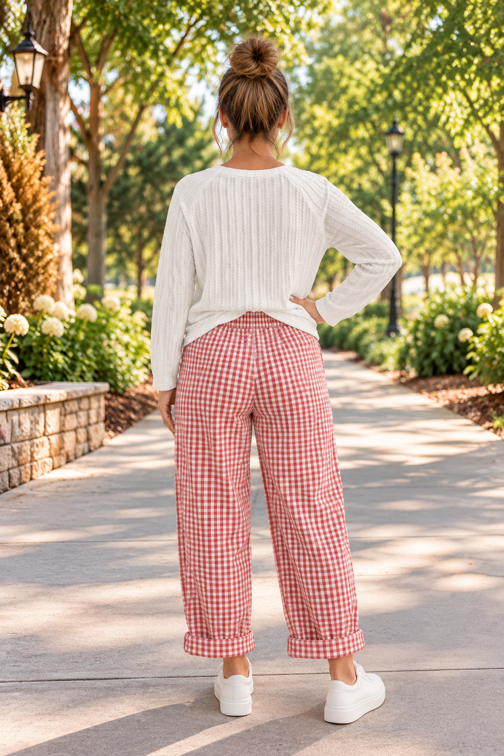 The Reece Pants in red and cream gingham with wide cuffed legs, a drawstring waist, front pockets, and vertical seams back view.