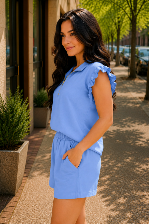 * Two-piece set
* Collared neck
* Half zip top
* Flutter sleeves
* Elastic waist
* Pocketed
* No stretch