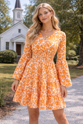 * Midi Dress
* Smocked
* Long flared sleeve
* V-neck
* Tiered
* Ruffle hem
* Unlined
* Slightly stretchy