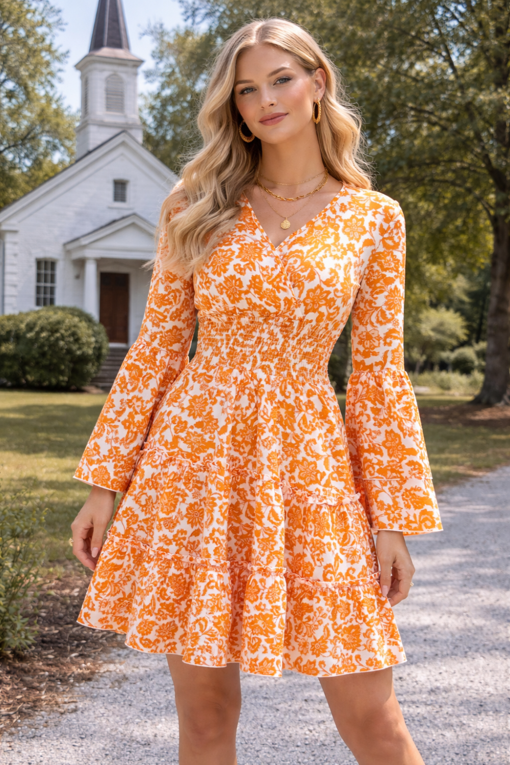 * Midi Dress
* Smocked
* Long flared sleeve
* V-neck
* Tiered
* Ruffle hem
* Unlined
* Slightly stretchy
