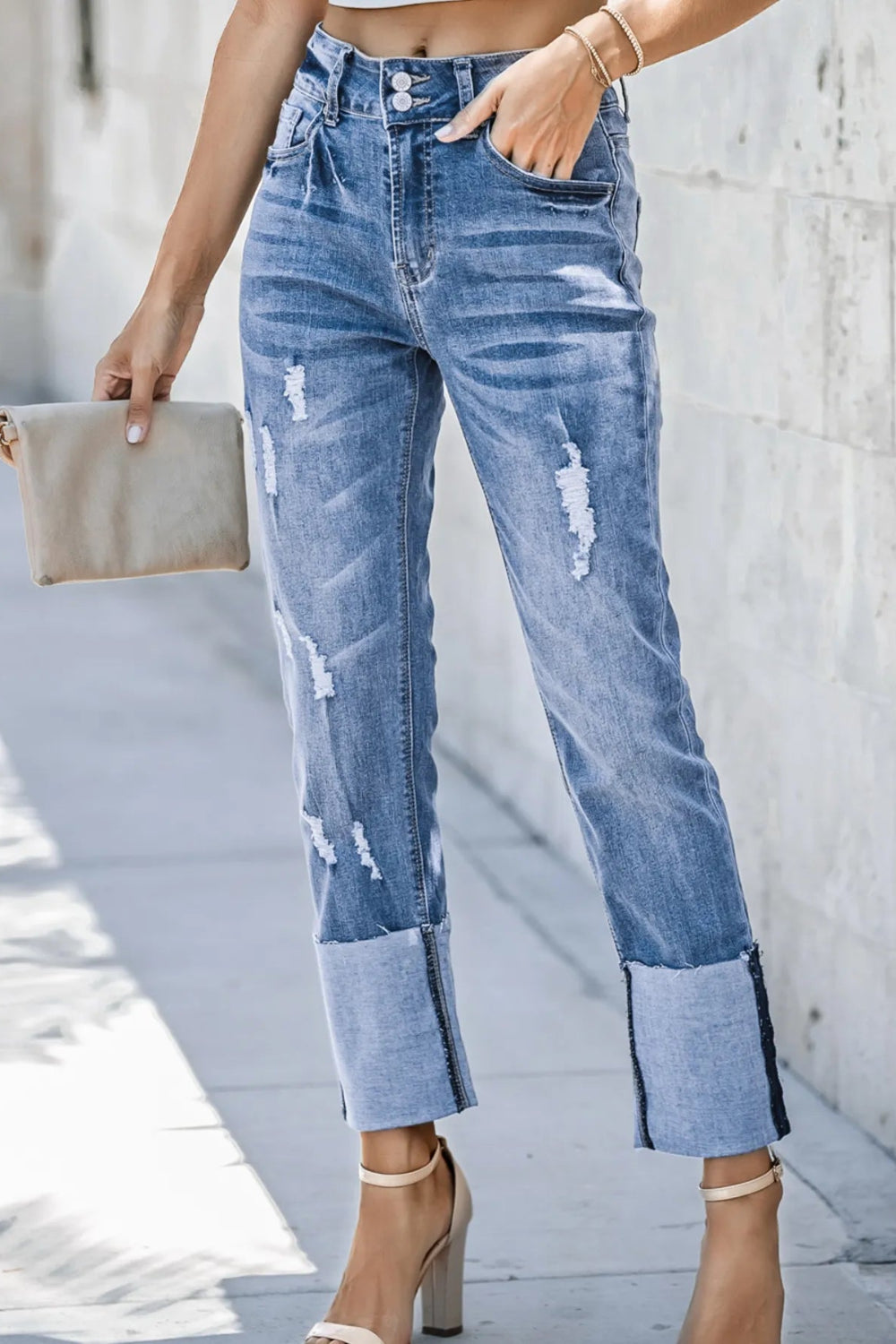 Jeans, straight leg, high-rise, distressed, pocketed, belt loops, raw hem, double button/zipper closure, slightly stretchy, front view