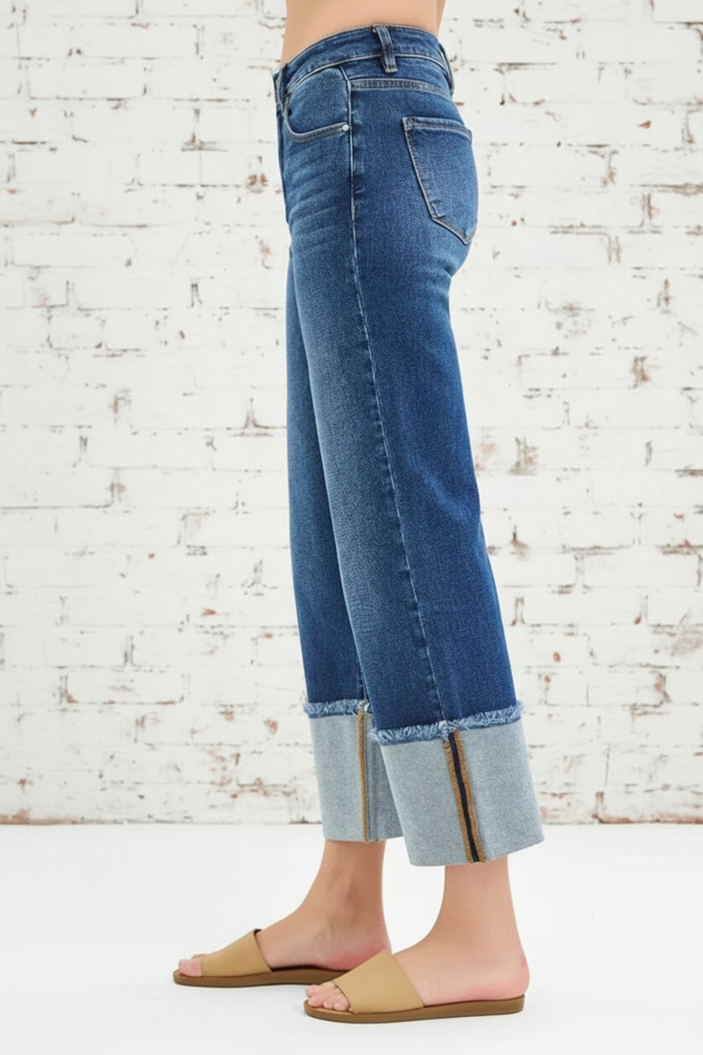 Risen Jeans, full-size, mid-rise, cropped, raw hem, cuffed, wide leg, dark wash, belt loops, pocketed, button/zipper closure, slightly stretchy, side view