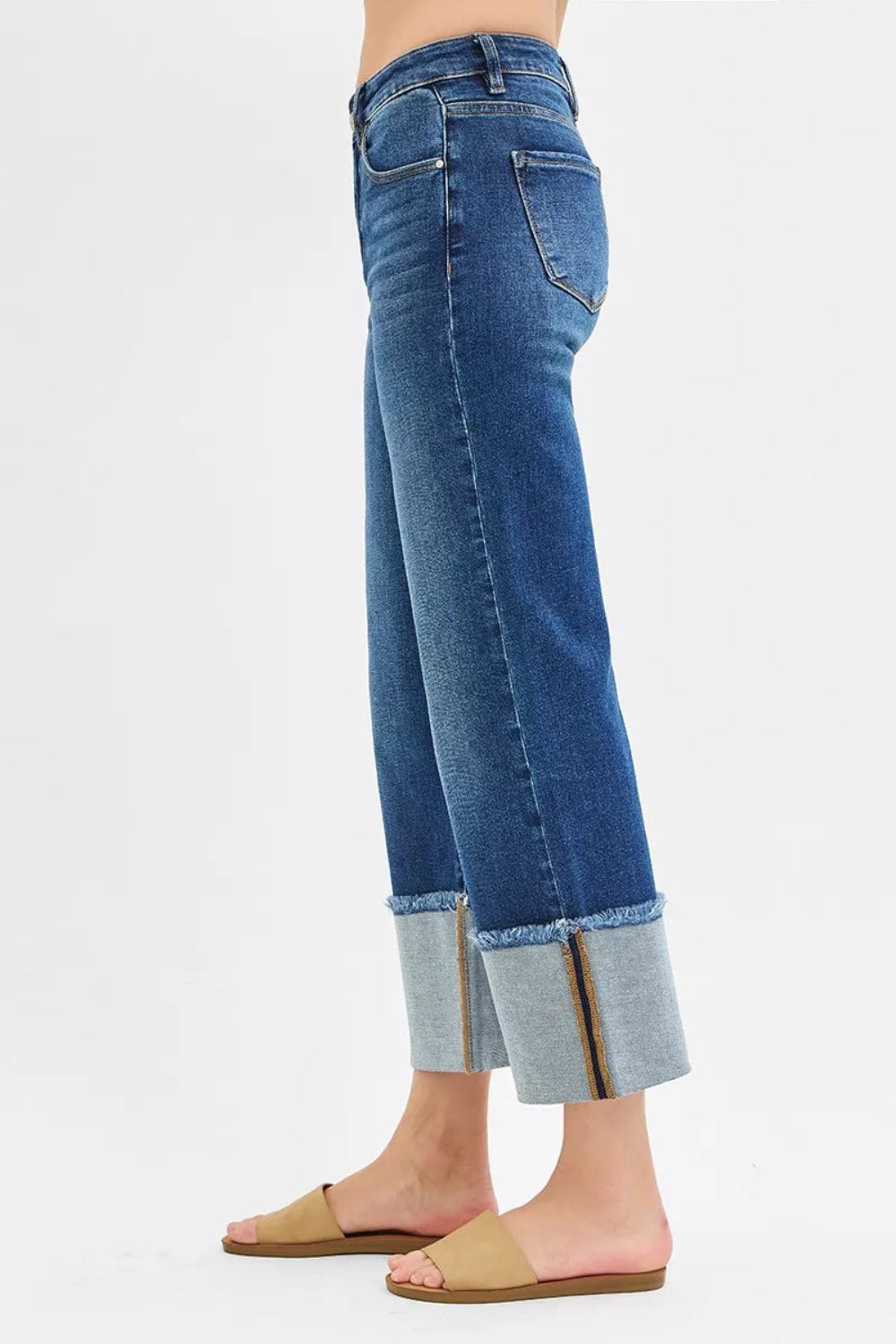 Risen Jeans, full-size, mid-rise, cropped, raw hem, cuffed, wide leg, dark wash, belt loops, pocketed, button/zipper closure, slightly stretchy, side view