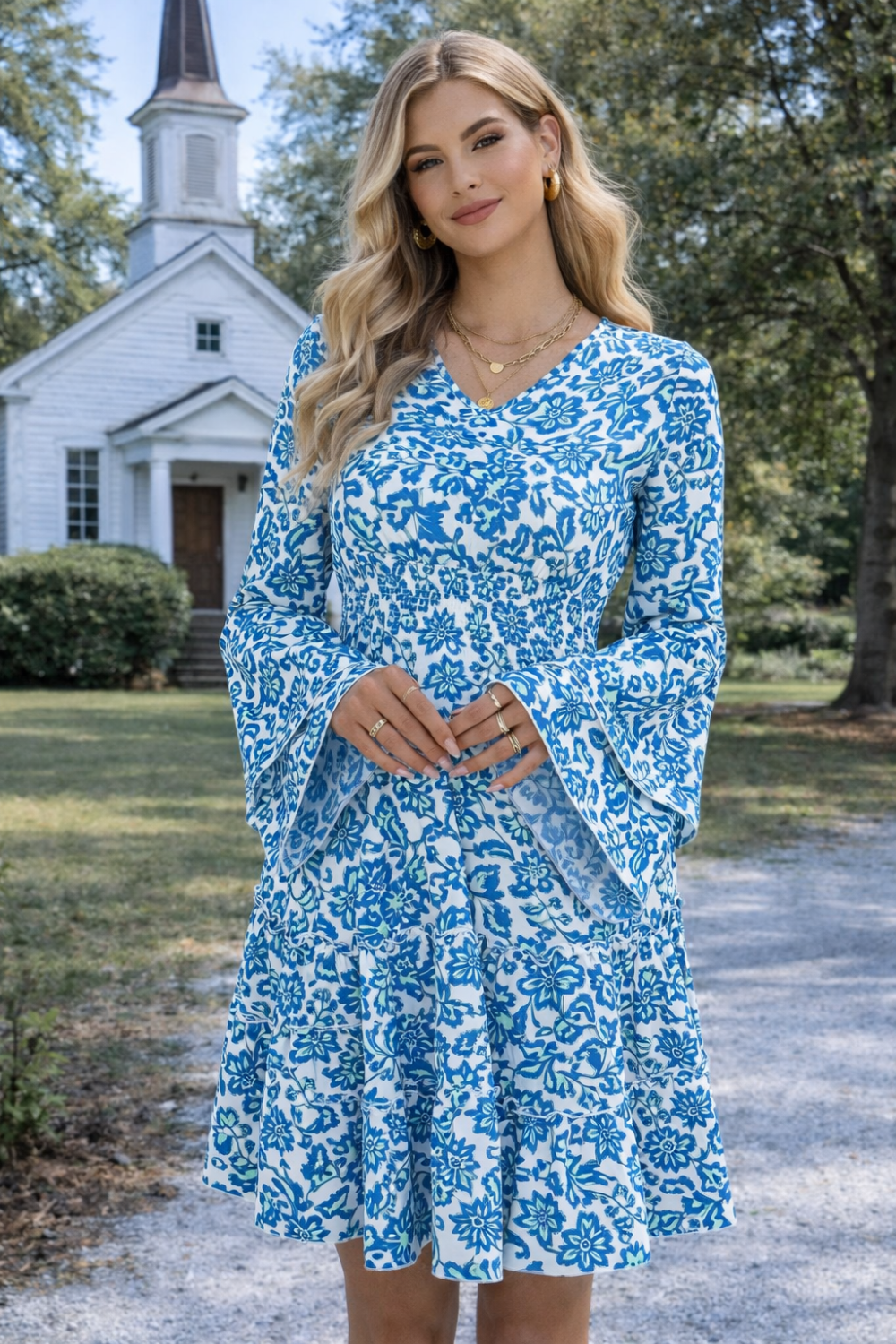 * Midi Dress
* Smocked
* Long flared sleeve
* V-neck
* Tiered
* Ruffle hem
* Unlined
* Slightly stretchy