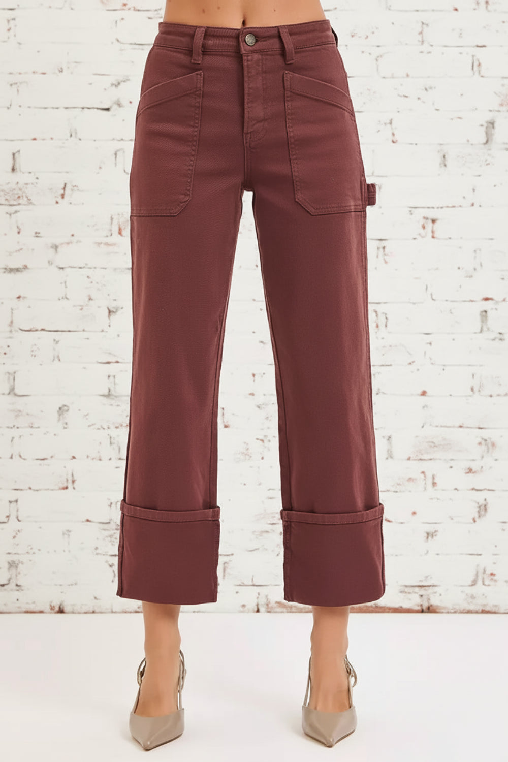 Risen jeans, full-size, high-rise, carpenter, wide leg, relaxed fit, pocketed, button/zipper closure, belt loops, cuffed hem, slightly stretchy, front view