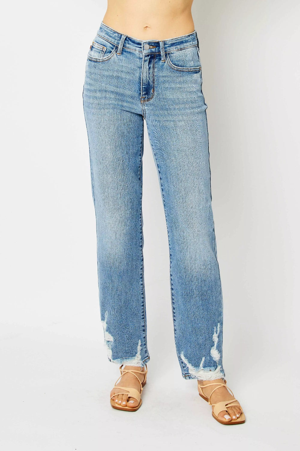 Judy Blue Jeans, full-size, high-rise, pocketed, belt loops, button/zipper closure, medium wash, straight leg, destroyed, raw hem, slightly stretchy, front view
